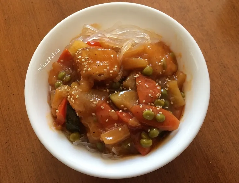 gluten-free sweet and sour sauce with tofu and vegetables on noodles